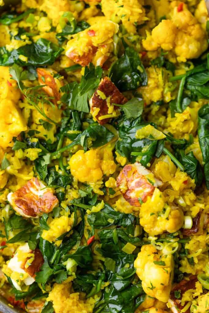 Curry Rice with cauliflower florets and fried halloumi mixed in