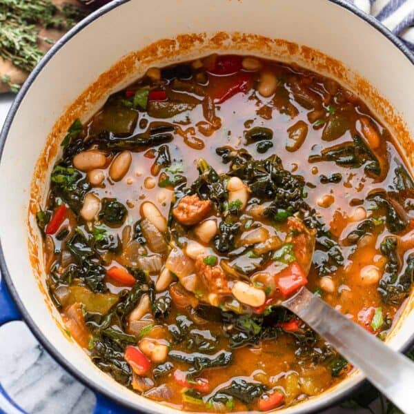 a soup pot full of Spanish Chorizo and White Bean Soup