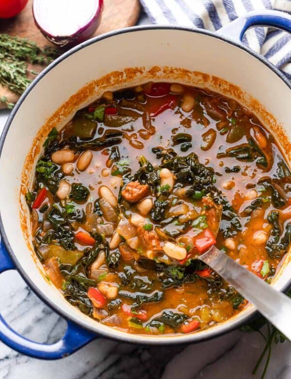 a soup pot full of Spanish Chorizo and White Bean Soup