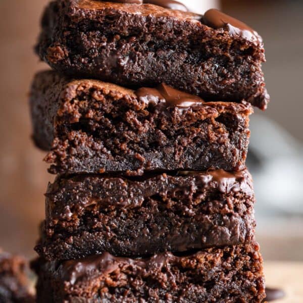 a stack of four Almond Butter Flourless Brownies