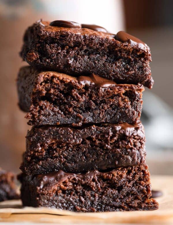 a stack of four Almond Butter Flourless Brownies