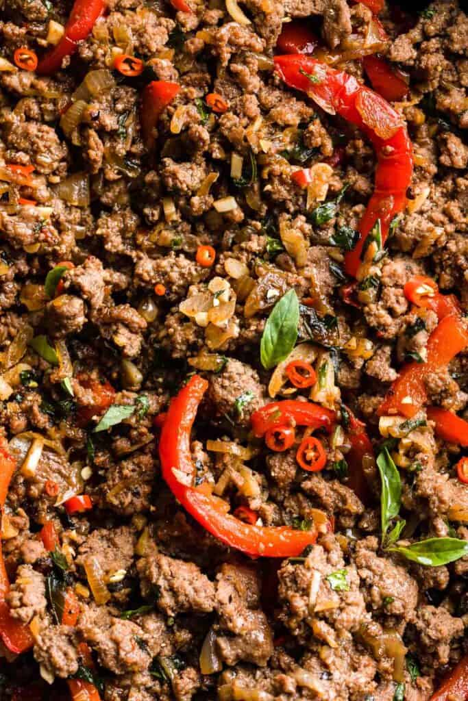 ground beef cooked into a thai Beef stir fry with red bell peppers, thai basil and chilies