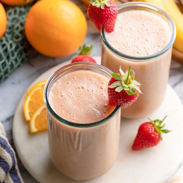 a couple of glasses of strawberry ginger smoothie