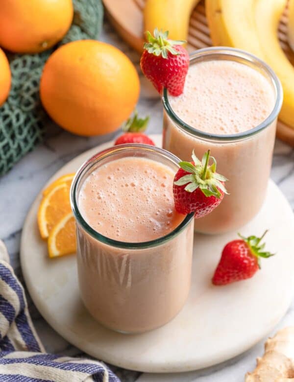a couple of glasses of strawberry ginger smoothie
