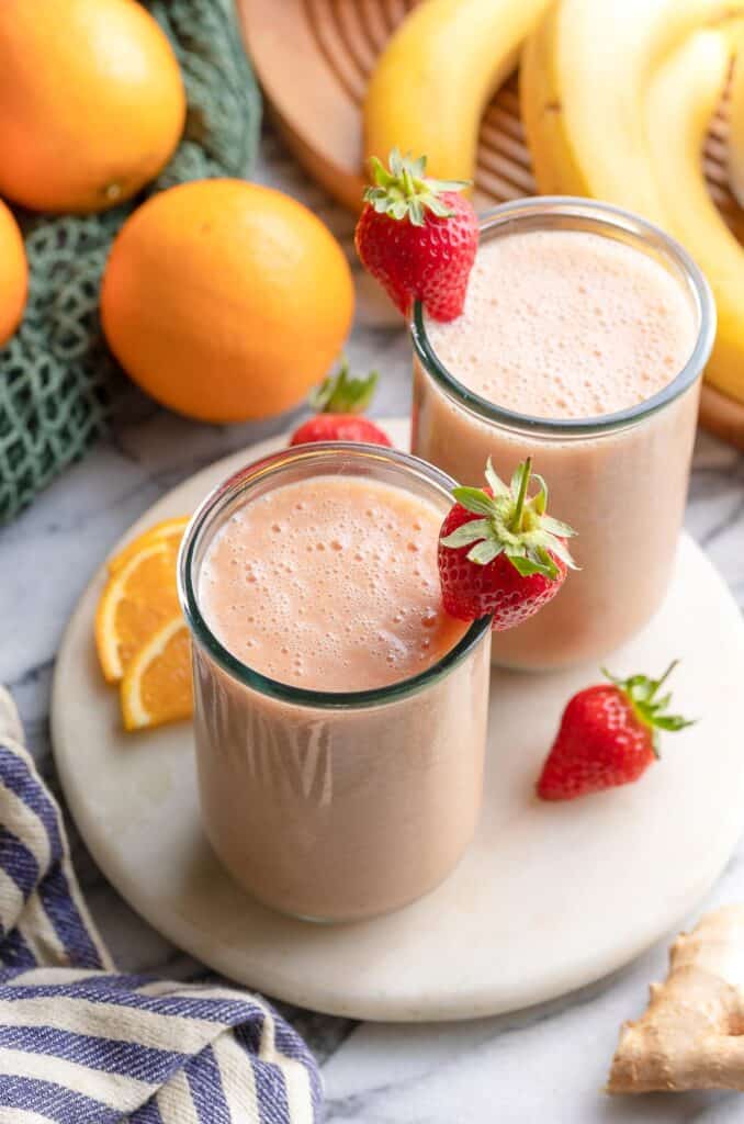 a couple of glasses of strawberry ginger smoothie