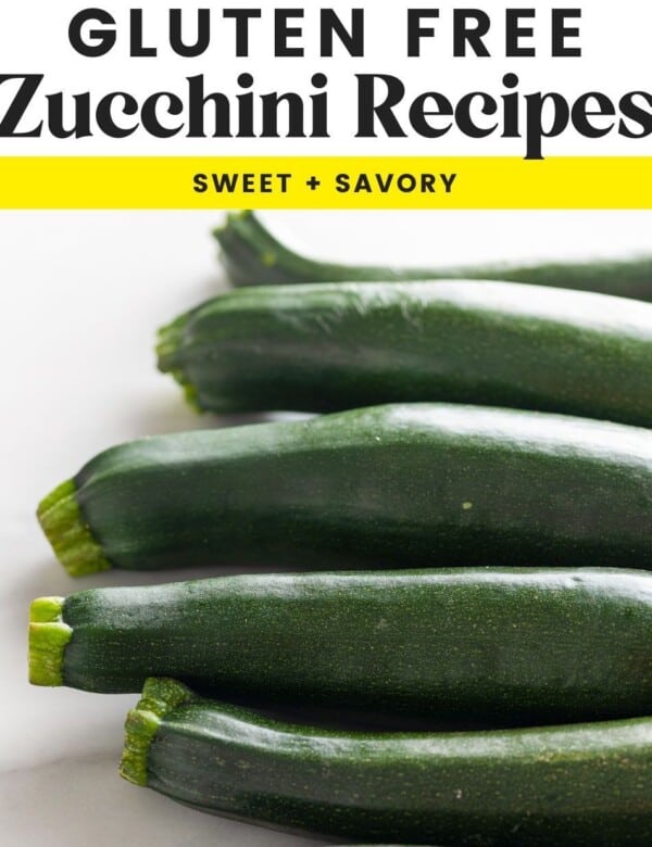 gluten free zucchini recipes: sweet + savory marketing image with 5 raw zucchinis in a row