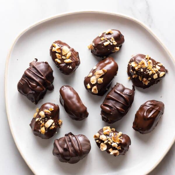 chocolate covered dates on a plate