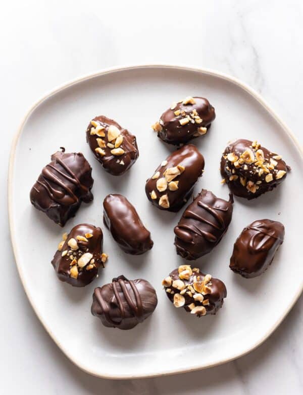 chocolate covered dates on a plate