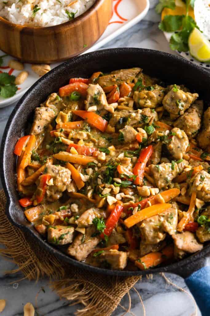 Peanut Chicken Stir Fry in a cast iron skillet