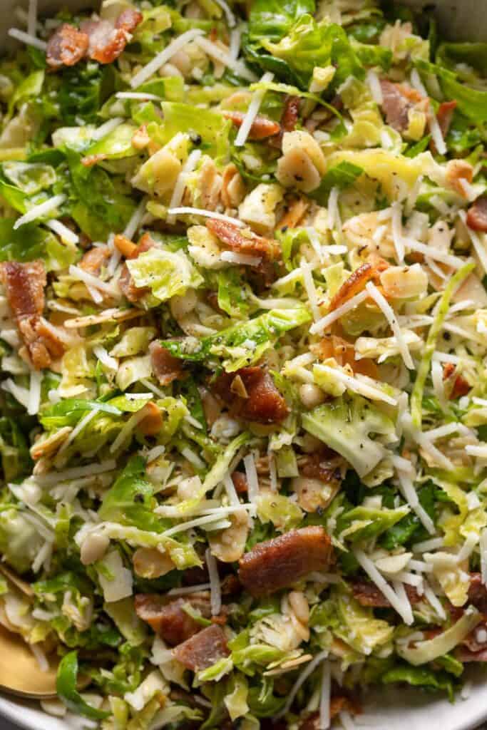 shredded brussels sprouts, chopped bacon, pine nuts, flakes almonds and parmesan cheese