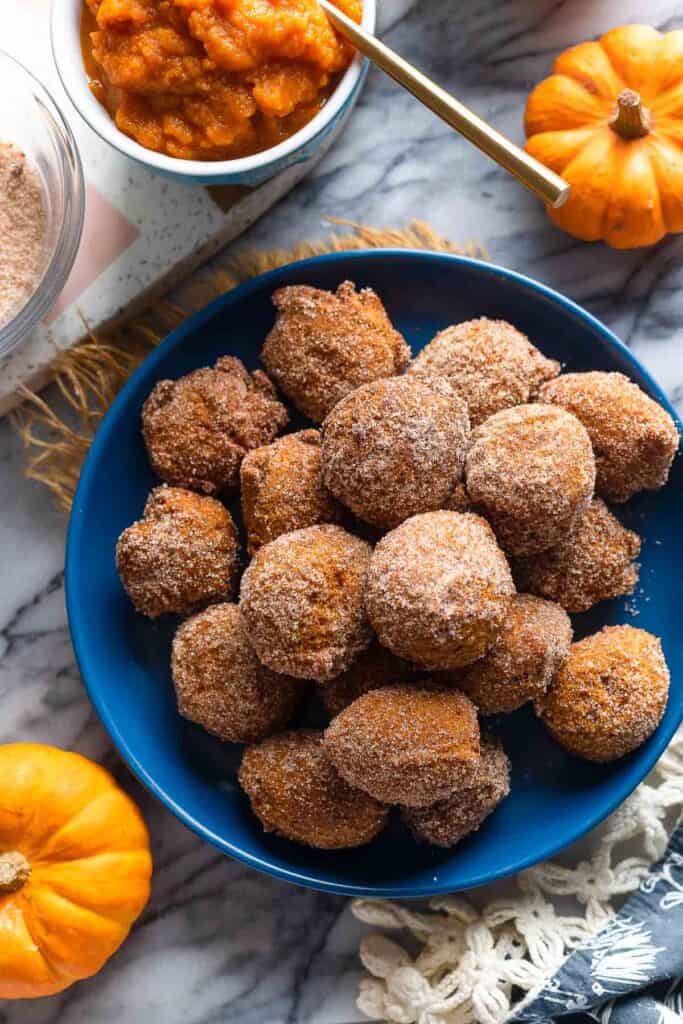 Gluten Free Pumpkin Fritters piled on a plate