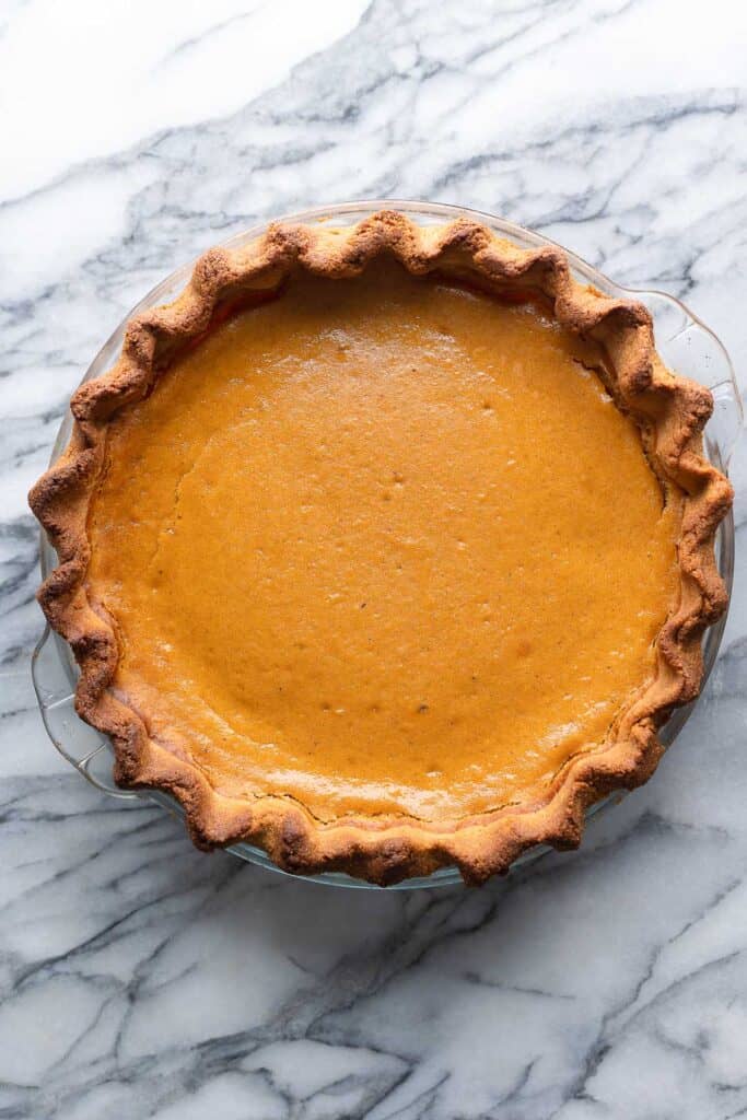 gluten free sweet potato pie on a marble surface