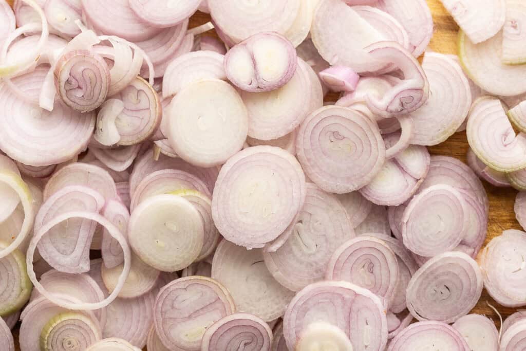 raw shallots cut into thin round slices 