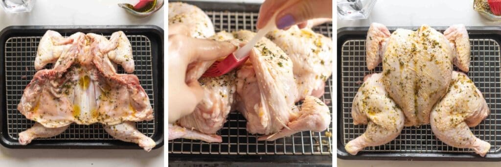 Raw, butterflied chicken place on a wire rack over a baking sheet covered in a  thyme, fennel and lemon zest spice mixture on the bottom, under the skin and on over the top.