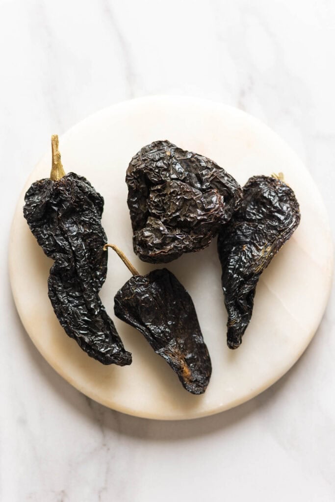Four whole, dried ancho chiles.