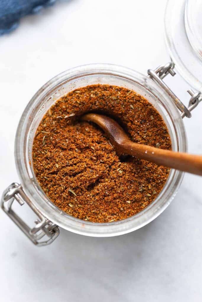 Low FODMAP Taco Seasoning in a spice jar.