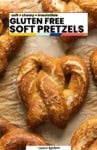 Gluten Free Soft Pretzels Pinterest marking image of homemade pretzels on a marble surface: "soft + chewy + irresistible"