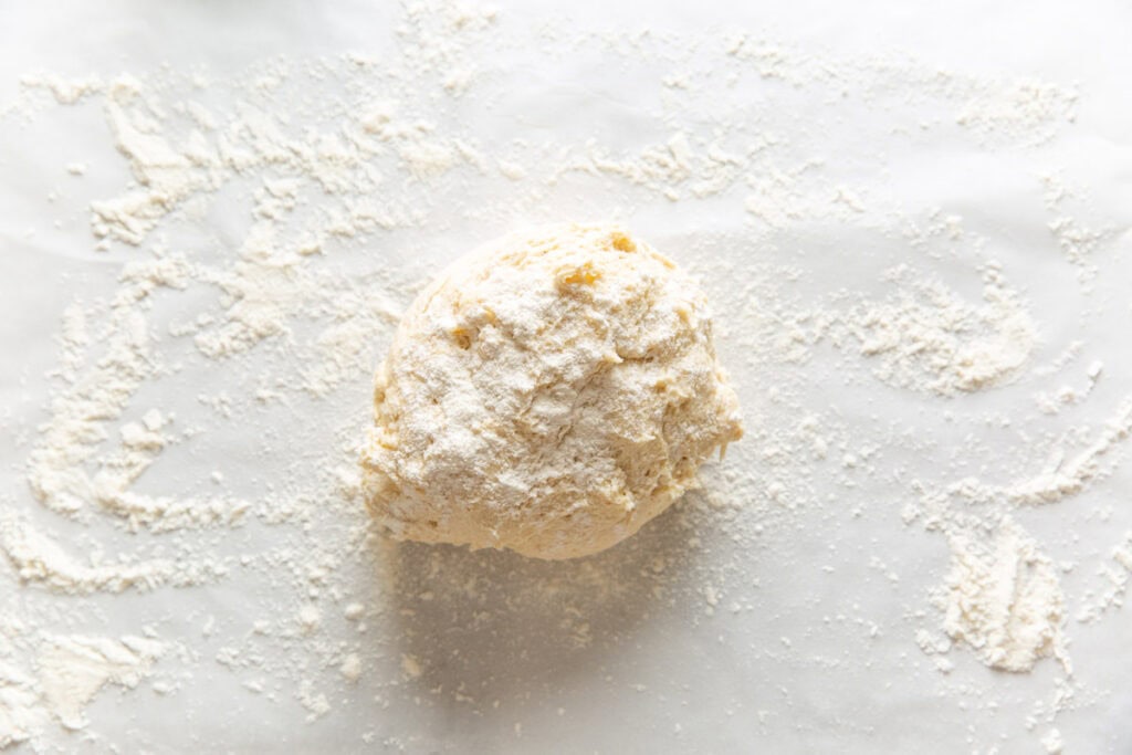 Gluten free cinnamon dough on a lightly floured surface.