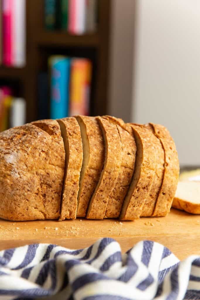 A sliced loaf of Gluten Free Sandwich Bread viewed from the side