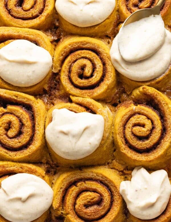 Gluten Free Pumpkin Cinnamon Rolls - some frosted and some unfrosted.