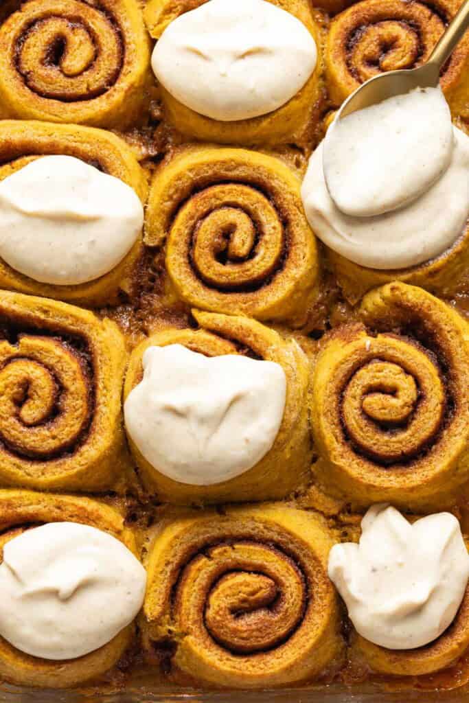 Gluten Free Pumpkin Cinnamon Rolls - some frosted and some unfrosted.