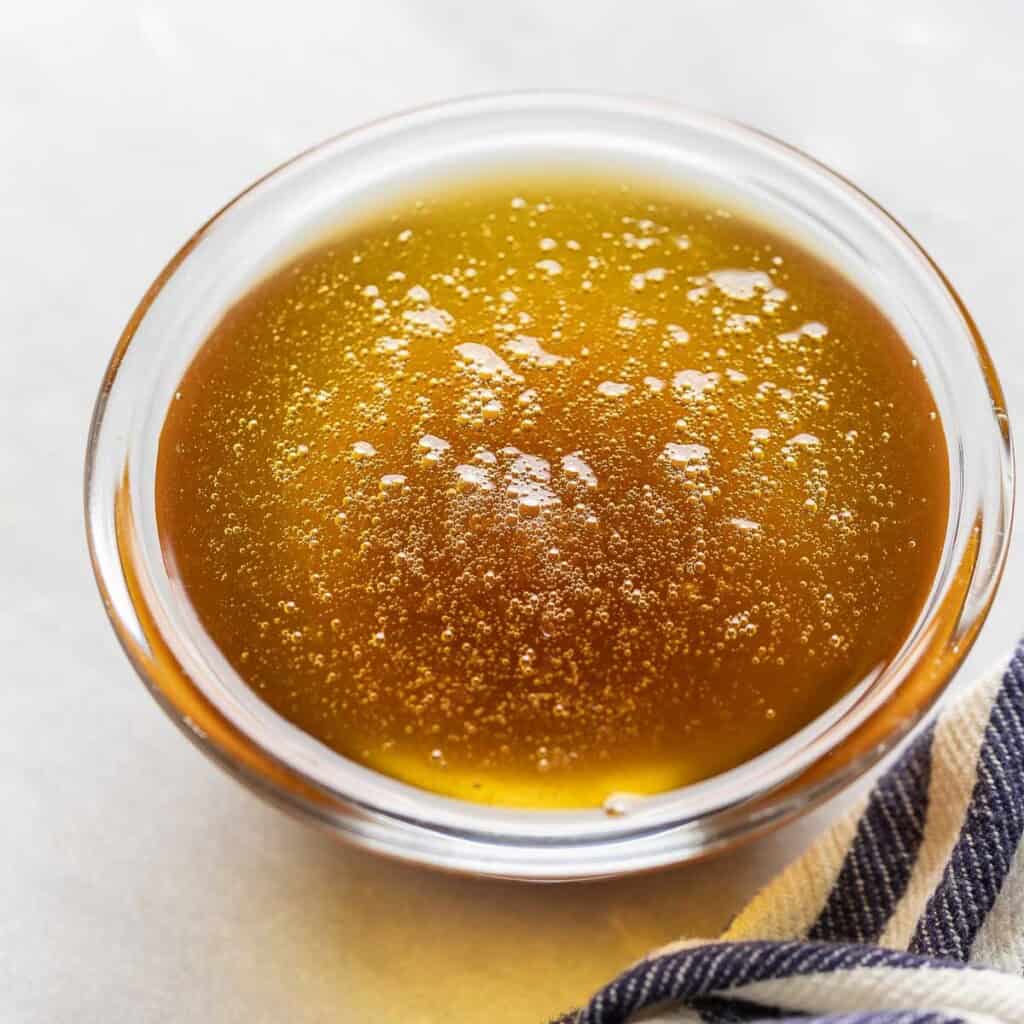 Browned butter cooling in a small bowl.