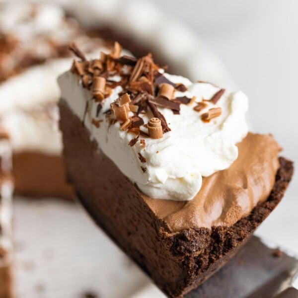 a slice of gluten free french silk pie held up on a spatula