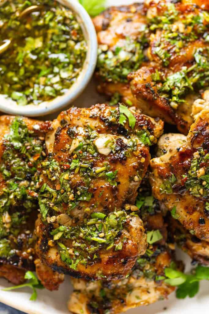 Grilled Chimichurri Chicken topped with fresh chimichurri sauce