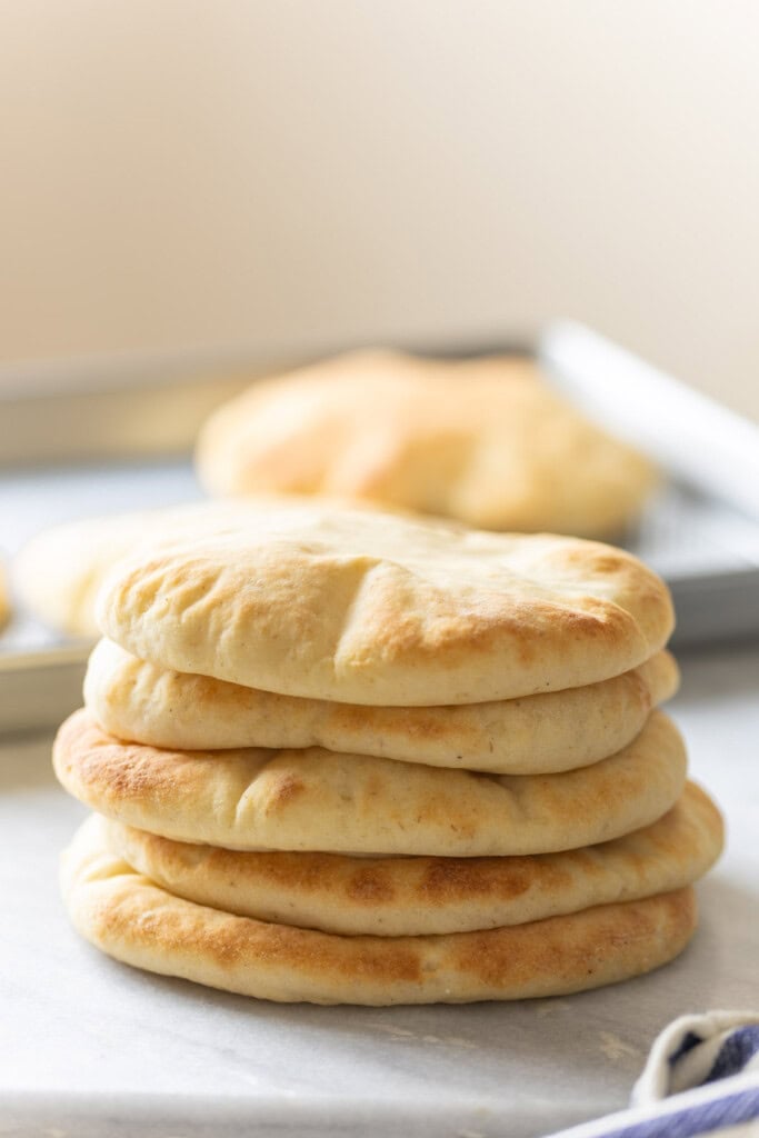 A stack of five homemade gluten free pita bread
