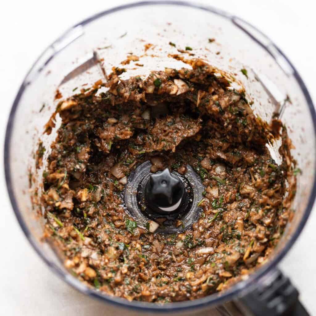 Blended up onion, garlic, parsley, spices, tomato paste and pomegranate molasses in a food processor.