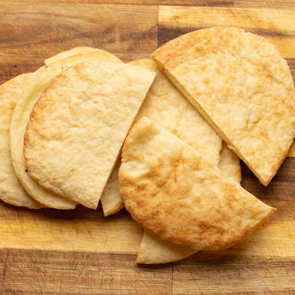 Gluten free pita breads cut in half