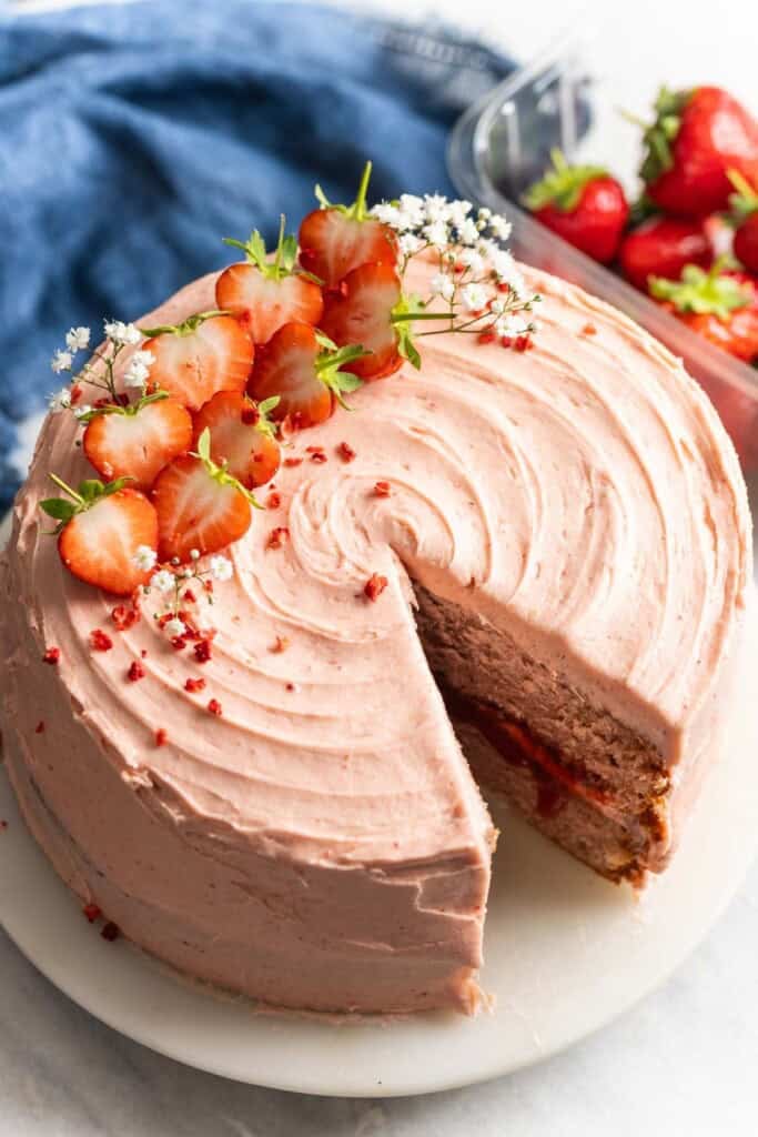 A slice taken from a gluten free strawberry cake