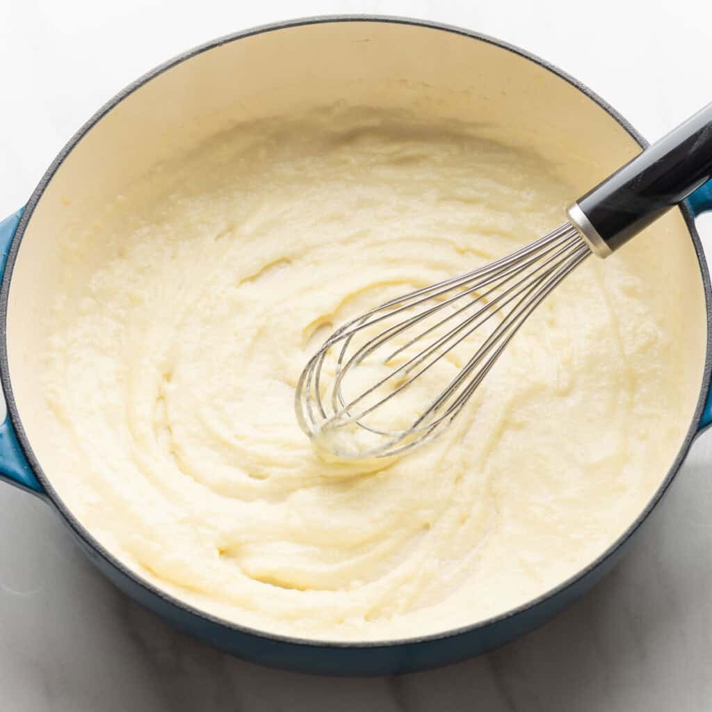 gluten free roux starter whisking in a casserole dish