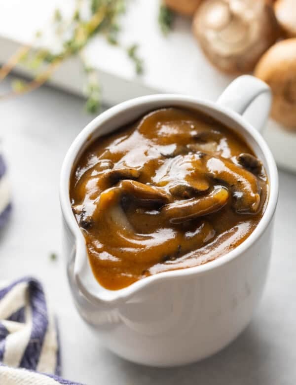 A gravy jug full of mushroom gravy