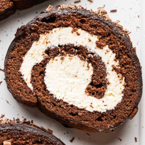 A gluten free chocolate swiss rolll with a mascarpone filling and dark chocolate ganache