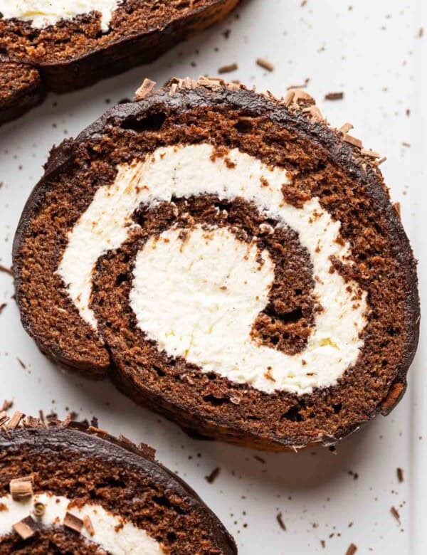 A gluten free chocolate swiss rolll with a mascarpone filling and dark chocolate ganache