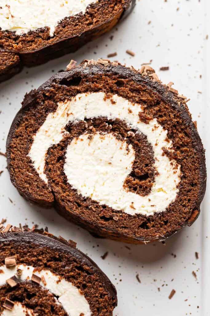 A gluten free chocolate swiss rolll with a mascarpone filling and dark chocolate ganache
